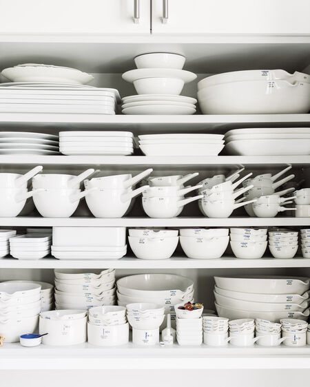 Karin Wudtke's kitchen cupboard, filled from top to bottom with KPM porcelain