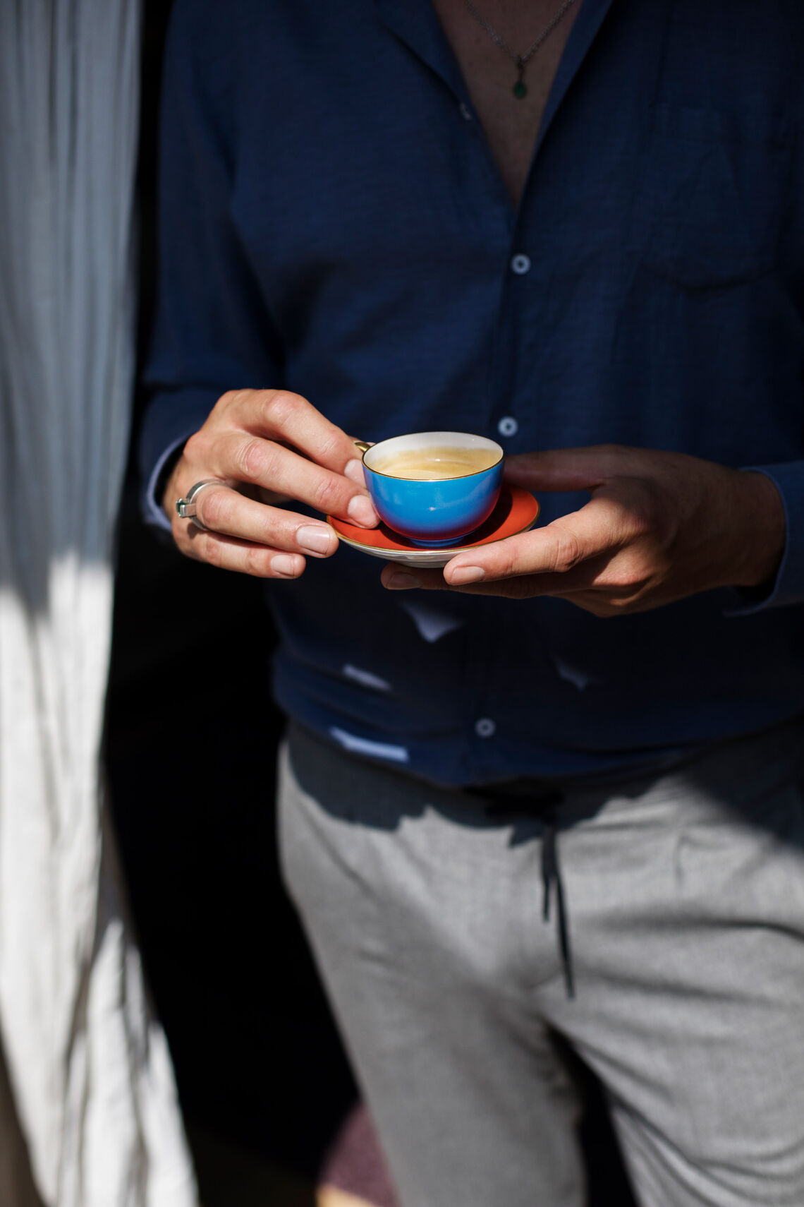 KPM visiting Markus Tenbusch Markus Tenbusch holds a blue espresso cup from the URBINO collection by KPM