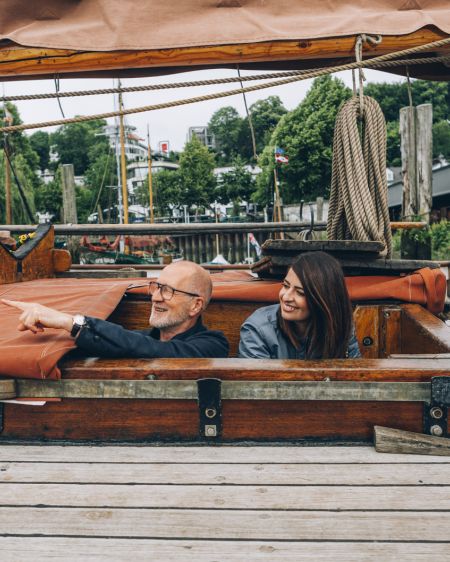 Linda Zervakis and Peter Lohmeyer on an old sailing boat at the museum harbour Oevelgönne in Hamburg