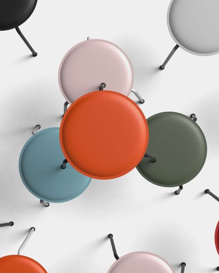 View from above several colorful linoleum stools