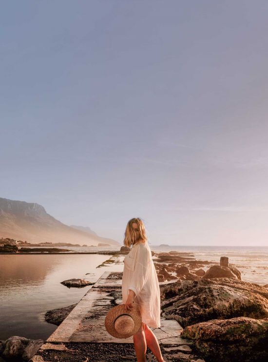 Places of desire for ADAC Motorwelt Woman on stone jetty by sea