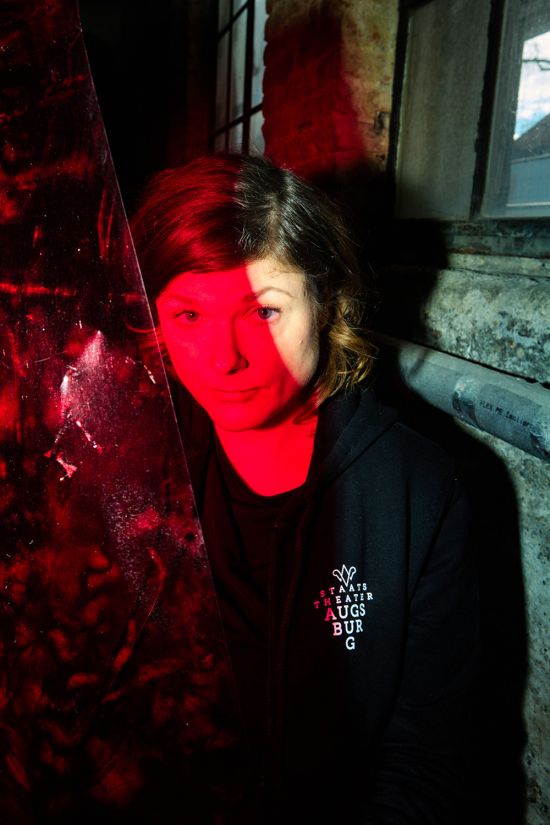 Interview Tina Lorenz for XPLR Media Tina Lorenz with red shadow on her face