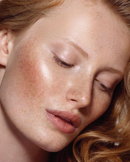 Close up of redhead woman with freckles