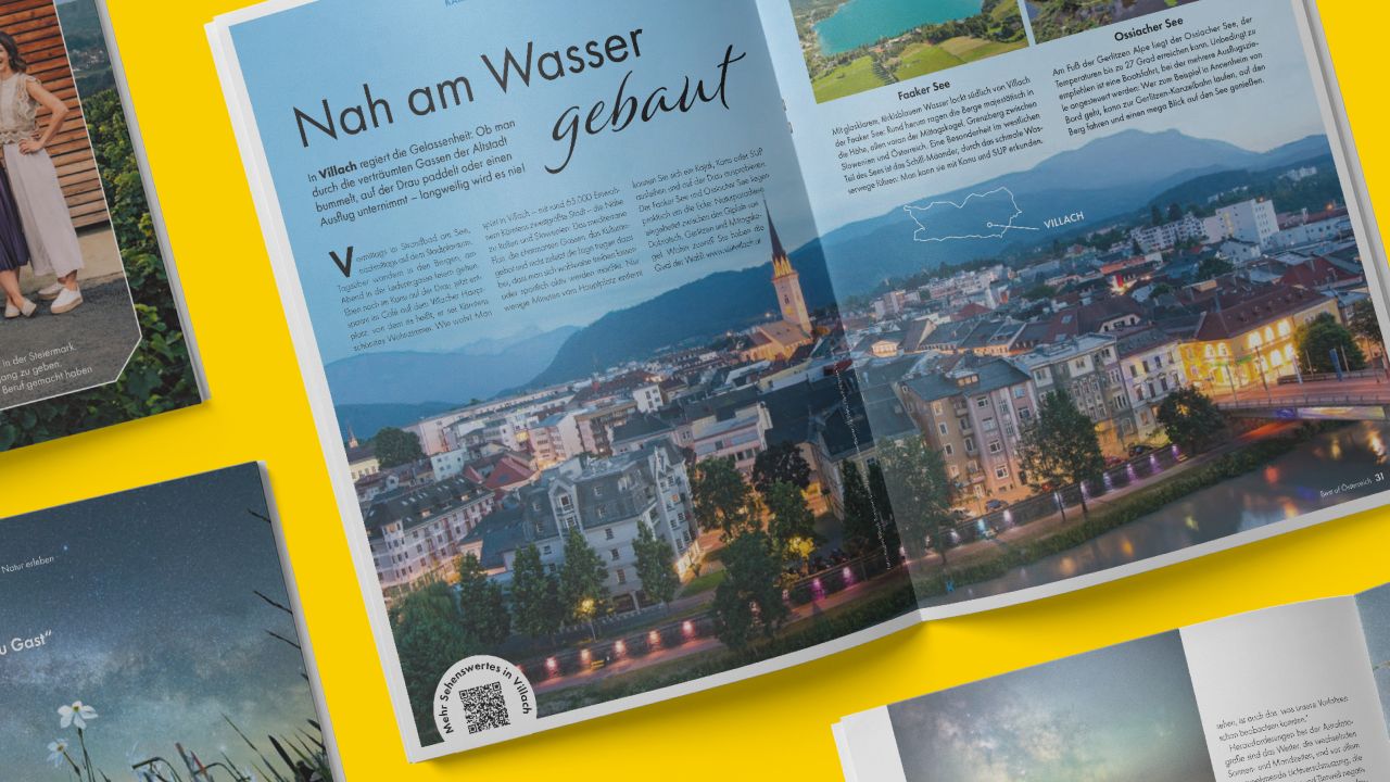 Doppelseite aus ADAC Urlaub Magazinbeilage "Best of Österreich" zeigt eine Abendaufnahme der Stadt Villach mit dem Titel "Nah am Wasser gebaut". Doppelseite aus ADAC Urlaub Magazinbeilage "Best of Österreich" zeigt eine Abendaufnahme der Stadt Villach mit dem Titel "Nah am Wasser gebaut".