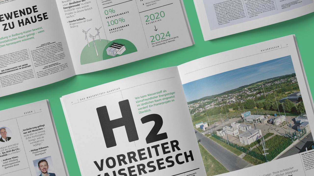 Double page from the SmartQuart final newspaper with the headline ‘H2 pioneer Kaisersesch’ and an aerial view of a hydrogen plant